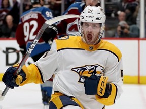 Predators forward Austin Watson had his suspension reduced from 27 games to 18 games by an arbitrator on Thursday, Oct. 11, 2018.