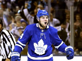 Maple Leafs' Auston Matthews celebrates his first goal of the season during the first period against the Canadiens in Toronto on Wednesday, October 3, 2018. (JACK BOLAND/TORONTO SUN)