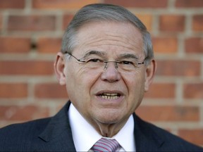 U.S. Sen. Bob Menendez, D-N.J., speaks to reporters after casting his vote in the New Jersey primary election at the Harrison Community Center in Harrison, N.J., on June 5, 2018.