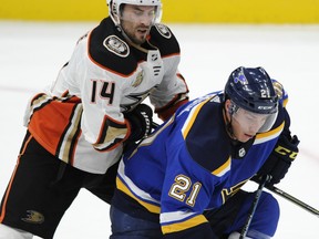 Former Leaf Tyler Bozak (right) returns with the St. Louis Blues to take on his old team Saturday night. (AP)