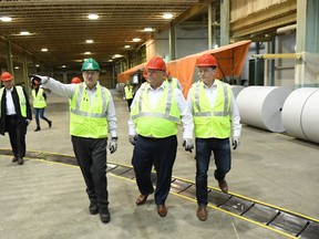 Premier Doug Ford, centre, tours a paper mill in Thunder Bay on Thursday, Oct. 25, 2018. (FordNation/Twitter)