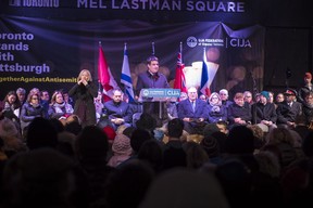 A large crowd gathers for a vigil for the shooting in Pittsburgh at Mel Lastman Square in North York, Ont., on Monday, October 29, 2018. (Tijana Martin/The Canadian Press)