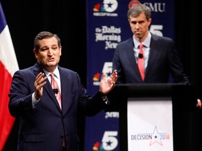 Sen. Ted Cruz (R-TX) makes his final remarks as Rep. Beto O'Rourke (D-TX) listens during a debate at McFarlin Auditorium at SMU on Sept. 21, 2018 in Dallas, Texas.