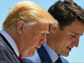 US President Donald Trump, left, with Canadian Prime Minister Justin Trudeau during the G7 Summit in La Malbaie, Quebec, Canada, June 8, 2018.