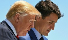 US President Donald Trump (L) speaks with Canadian Prime Minister Justin Trudeau during the G7 Summit in La Malbaie, Quebec, Canada, June 8, 2018. / AFP PHOTO / SAUL LOEBSAUL LOEB/AFP/Getty Images