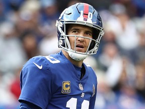 Eli Manning of the New York Giants walks off the field after failing to convert a first down in the fourth quarter against the Washington Redskins during their game at MetLife Stadium on Oct. 28, 2018 in East Rutherford, N.J.