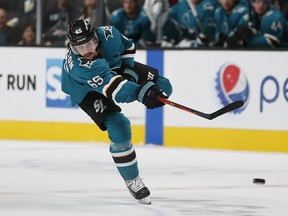 Sharks' Erik Karlsson shoots against the Calgary Flames during the third period of a pre-season game in San Jose, Calif. (AP PHOTO)