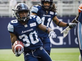 Toronto Argonauts running back Martese Jackson (30) runs the ball in fourth quarter CFL action against the B.C. Lions in Toronto on Saturday, August, 18, 2018. The Edmonton Eskimos have acquired Jackson and a conditional sixth-round draft pick in the 2020 CFL draft from the Toronto Argonauts.