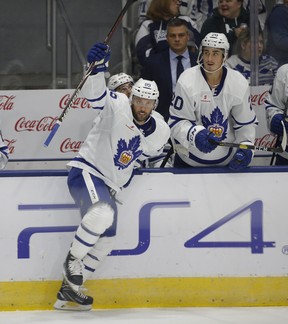 Marlies coach Sheldon Keefe (back) appreciates Sam Gagner’s attitude and approach since arriving on the Marlies. JACK BOLAND/TORONTO SUN