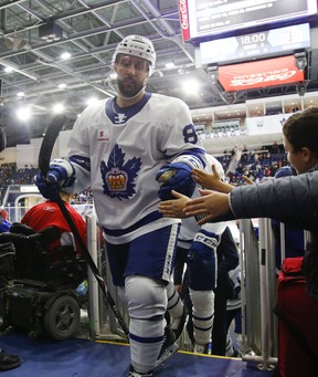 SMarlies forward am Gagner is greeted by fans as he leaves the ice during a game against the Hartford Wolfpack. Gagner was leant to the Marlies by the NHL’s Vancouver Canucks. JACK BOLAND/TORONTO SUN