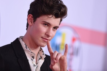 Canadian singer Shawn Mendes arrives at the 2018 American Music Awards on October 9, 2018, in Los Angeles, California. (Photo by Valerie MACON / AFP)