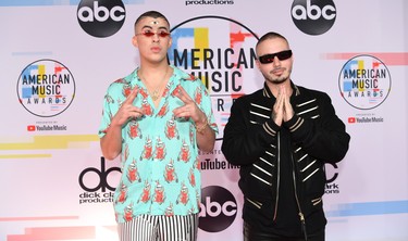LOS ANGELES, CA - OCTOBER 09:  Bad Bunny (L) and J Balvin attend the 2018 American Music Awards at Microsoft Theater on October 9, 2018 in Los Angeles, California.  (Photo by Emma McIntyre/Getty Images For dcp)
