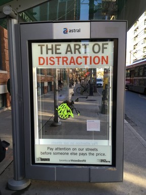 The Art of Distraction campaign poster shows a crushed bicycle helmet of a man who was killed by a car he had the right of way.