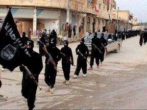 ISIS fanatics march in Syria before the caliphate came crumbling down.