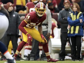 In this Dec. 24, 2017, file photo, Washington Redskins cornerback Josh Norman (24) looks across the line of scrimmage in Landover, Md. (AP Photo/Mark Tenally, File)