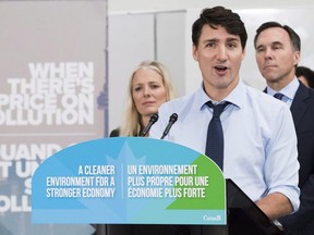 Prime Minister Justin Trudeau speaks to the media and students at Humber College regarding his government's new federally-imposed carbon tax in Toronto on Tuesday, Oct. 23, 2018.