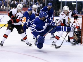 Maple Leafs centre John Tavares loses his footing on Saturday night against the Ottawa Senators at Scotiabank Arena in Toronto. (Veronica Henri/Toronto Sun)