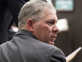 In this Dec. 3, 2012 file photo, Lenny Dykstra sits during his sentencing for grand theft auto in Los Angeles.