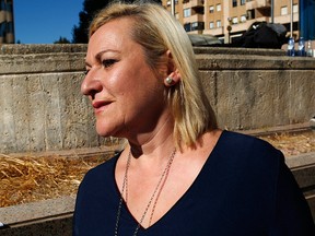 Ines Madrigal leaves a court in Madrid, Spain, Monday Oct. 8, 2018.