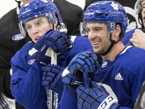 Mitch Marner (left) and John Tavares take a breather at the Leafs practice in Toronto on Wednesday, October 31, 2018. (Craig Robertson/Toronto Sun)