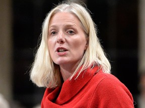 Minister of Environment and Climate Change Catherine McKenna rises during question period in the House of Commons on Parliament Hill, in Ottawa on Tuesday, Oct. 2, 2018.