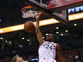 Raptors Norman Powell dunks against Melbourne last night. Powell had 21 points, three rebounds and three assists, hitting 3-of-5 three-point attempts.  
(Jack Boland/Toronto Sun)