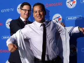 Blue Jays GM Ross Atkins introduces Charlie Montoyo as the new manager on October 29, 2018. Dave Abel/Toronto Sun