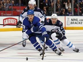 William Nylander of the Toronto Maple Leafs breaks past Paul Stastny of the Winnipeg Jets at the Air Canada Centre on March 31, 2018 in Toronto,. (Claus Andersen/Getty Images)