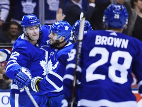 Maple Leafs’ Patrick Marleau (left) celebrates his goal against the Los Angeles Kings with teammates Josh Leivo, Andreas Johnsson and Connor Brown on Monday night. Toronto hosts Pittsburgh on Thursday and St. Louis on Saturday. (CP PHOTO)