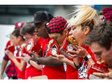 Miki Sudo at the 8th Annual SmokeÕs Poutinerie World Poutine Eating Championship held at Yonge-Dundas Square in downtown Toronto, Ont.  on Saturday October 14, 2017. Ernest Doroszuk/Toronto Sun/Postmedia Network