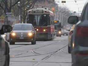 A TTC streetcar is seen on Queen St. E., west of Broadview Ave., in this file photo. (Stan Behal/Toronto Sun)