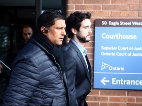Marco Muzzo leaves court with his mom and his fiancee after pleading guilty and posted 1 million dollar bail until his Feb 23rd sentencing in Newmarket Court on Thursday February 4, 2016. Dave Abel/Toronto Sun/Postmedia Network
