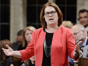 Minister of Indigenous Services Jane Philpott rises during question period in the House of Commons on Parliament Hill in Ottawa on Thursday, Sept. 27, 2018.