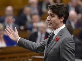 Prime Minister Justin Trudeau rises during question period in the House of Commons on Parliament Hill in Ottawa on Wednesday, Oct. 31, 2018.