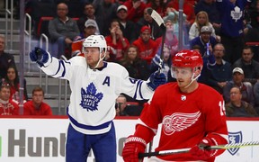 Maple Leafs’ Morgan Rielly celebrates a first-period goal on Thursday night against the Red Wings in Detroit. (GETTY IMAGES)