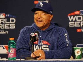 Dodgers manager Dave Roberts speaks to reporters on Monday. GETTY IMAGES