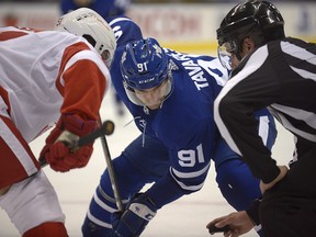 Toronto Maple Leafs' John Tavares prepares to take a faceoff against Detroit Red Wings' Frans Nielsen during the second period of their NHL preseason game in Toronto on Friday, Sept. 28, 2018.
