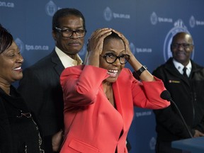 Lyneth Mann-Lewis describes how she felt being reunited with her abducted son after 31 years, at a press conference at Police Headquarters on Monday. (Stan Behal/Toronto Sun)