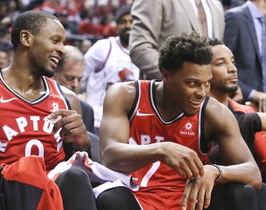 Toronto Raptors guard Kyle Lowry (7)  and Toronto Raptors forward CJ Miles (0) during the game in Toronto, Ont. on Wednesday October 17, 2018. Toronto Raptors host the Cleveland Cavaliers at the Scotiabank Arena.  (Veronica Henri/Toronto Sun/Postmedia Network)