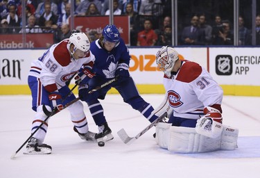 Montreal Canadiens Carey Price G (31) makes a poke save on Toronto Maple Leafs Kasperi Kapanen RW (24) during the third period in Toronto on Thursday October 4, 2018. Jack Boland/Toronto Sun/Postmedia Network