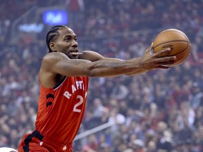 iToronto Raptors forward Kawhi Leonard (2)n Toronto, Ont. on Wednesday October 17, 2018. Toronto Raptors host the Cleveland Cavaliers at the Scotiabank Arena.  (Veronica Henri/Toronto Sun/Postmedia Network)