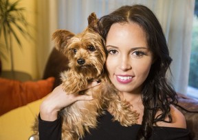 Monica Niemkiewicz with her dog Muffy on Wednesday, October 24, 2018. Muffy was stolen in a robbery and has just been reunited with her owner. Craig Robertson/Toronto Sun