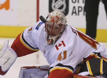 Calgary Flames Mike Smith G (41) keeps his eye on the puck during the third period in Toronto on Tuesday October 30, 2018. Jack Boland/Toronto Sun/Postmedia Network