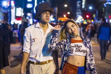 Bruce Doan and Pamela Elliott in character as Halloween comes to the Village as a part of Church St. is closed to traffic for Halloween on Church in Toronto, Ont. on Wednesday October 31, 2018. Ernest Doroszuk/Toronto Sun/Postmedia