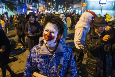 Yuki Ishihara, as Halloween comes to the Village as a part of Church St. is closed to traffic for Halloween on Church in Toronto, Ont. on Wednesday October 31, 2018. Ernest Doroszuk/Toronto Sun/Postmedia