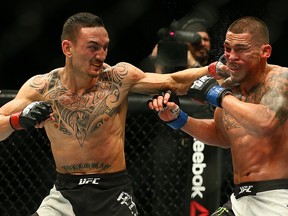 Max Holloway defeats Anthony Pettis during the main card of UFC 206 at the Air Canada Centre in Toronto on Saturday, December 11, 2016. (Dave Abel/Toronto Sun)
