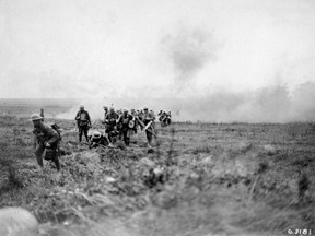 The battle against the German troops on the Hindenburg Line, the enemy trench system, saw waves of Canadian infantry attacking behind a barrage of artillery shells. (Canadian War Museum)