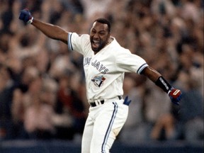 Former Blue Jay Joe Carter celebrates after slugging the World- Series-winning home run in 1993. GREIG REEKIE/TORONTO SUN FILE