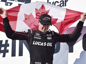 Robert Wickens celebrates his third place finish at the Honda Indy in Toronto on Sunday, July 15, 2018. (THE CANADIAN PRESS/FILE)