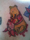 Winnie The Pooh eschews his usual diet of honey for Piglett in this Disney tattoo gone haywire. TWITTER